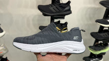 Load and play video in Gallery viewer, Skechers Vapor Foam Slip Ons
